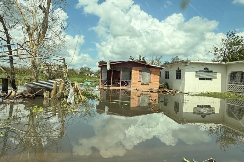 Überschwemmte und beschädigte Häuser