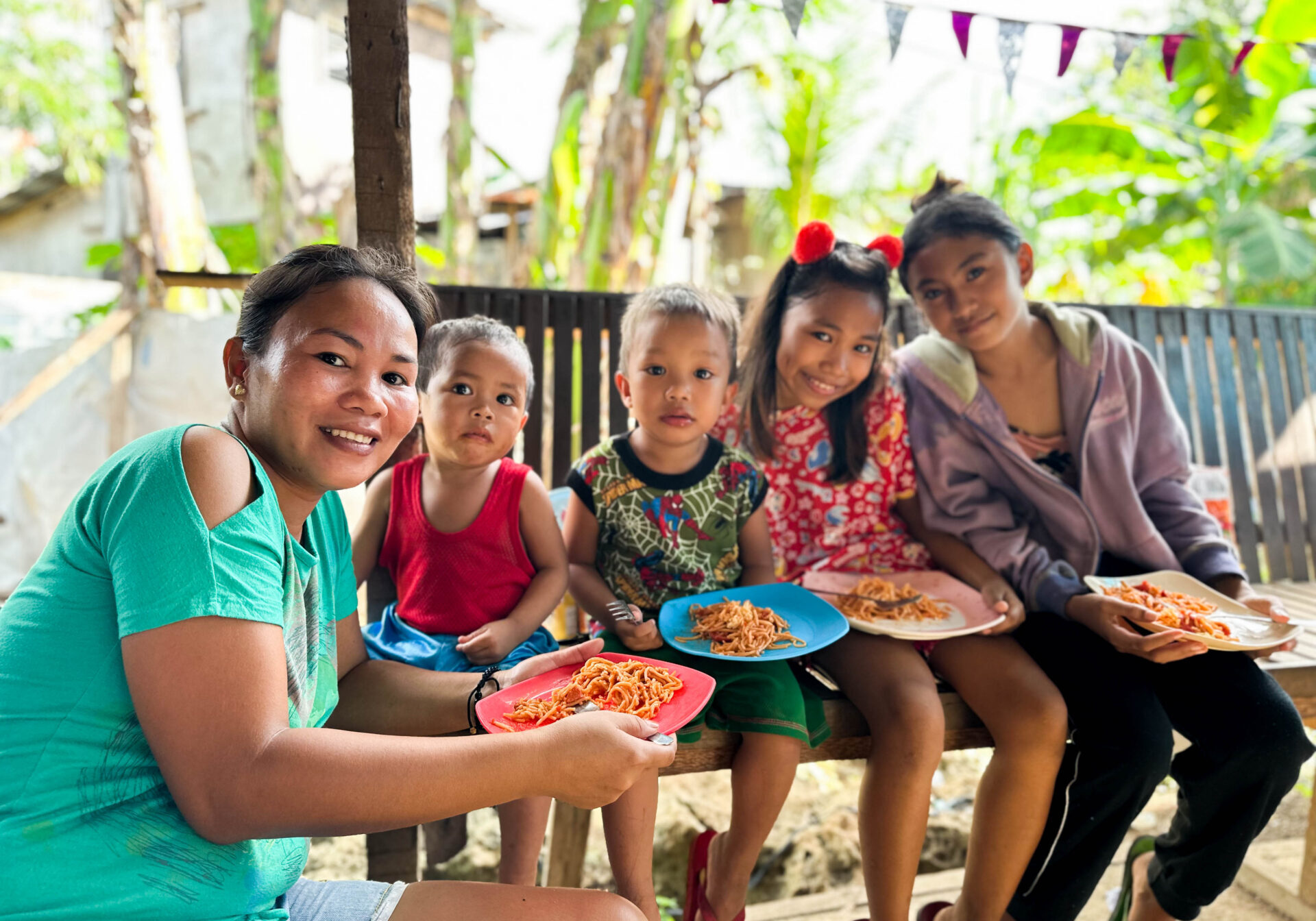 UBELINE OSIANAS

Ubeline Osianas, a 38-year-old  resident of Sitio Bagong Silingan, is one of the recipients that benefits from a tutoring and feeding from the Franciscans.

Ubeline shared her family's decision to move to the community eight years ago. Originally from Negros, they sought a better life due to the challenging conditions there. With family ties in their current community and more access to job opportunities, they decided to make a fresh start.

Ubeline expressed the daily struggles, emphasizing the financial challenges her family faces. However, Ubeline drew strength from her faith, turning to the Lord during moments of difficulty.

Ubeline emphasized that she is immensely grateful for help they received. The feeding programs and educational support provided by the Sisters  had a great impact on the community. These initiatives not only addressed immediate needs like hunger but also instilled values, teaching the children. 

“It’s not only the feeding program that’s helpful but the tutoring as well. They would teach them different values and introduce them to the Lord. Not a lot of children grow up knowing the Lord, and the ones who do are more respectful and fear of doing anything bad.” Nelly said.

The feeding programs have become a lifeline, ensuring that the children have a meal each day. The tutoring and the spiritual guidance to the children contribute to their overall well-being and character development.