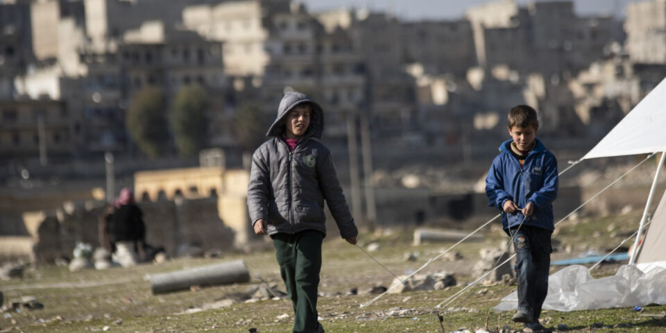 kids playing between the tents where they forced to live after the earthquake in Aleppo Feb 17,2023
